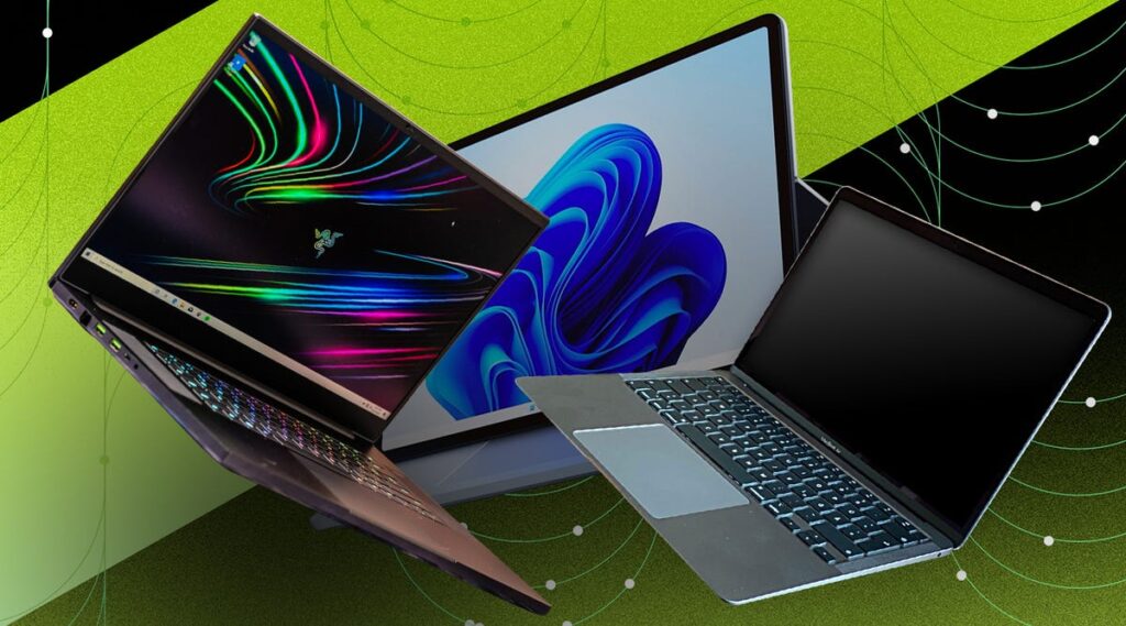 Laptops sobre fondo negro y verde